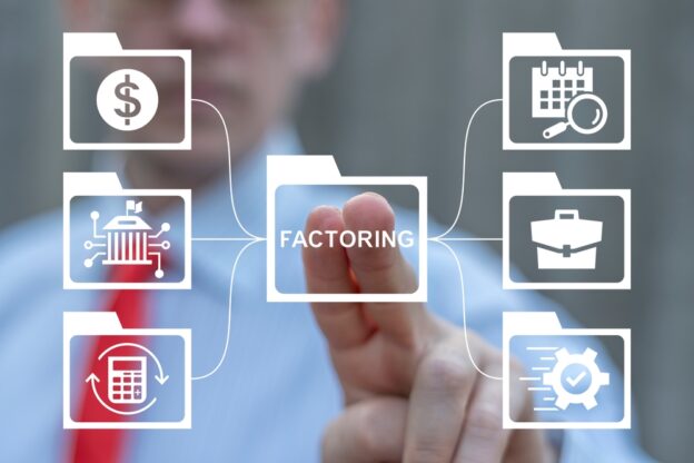 Factoring Business Finance Banking concept. Business person using virtual touch screen push text: FACTORING.